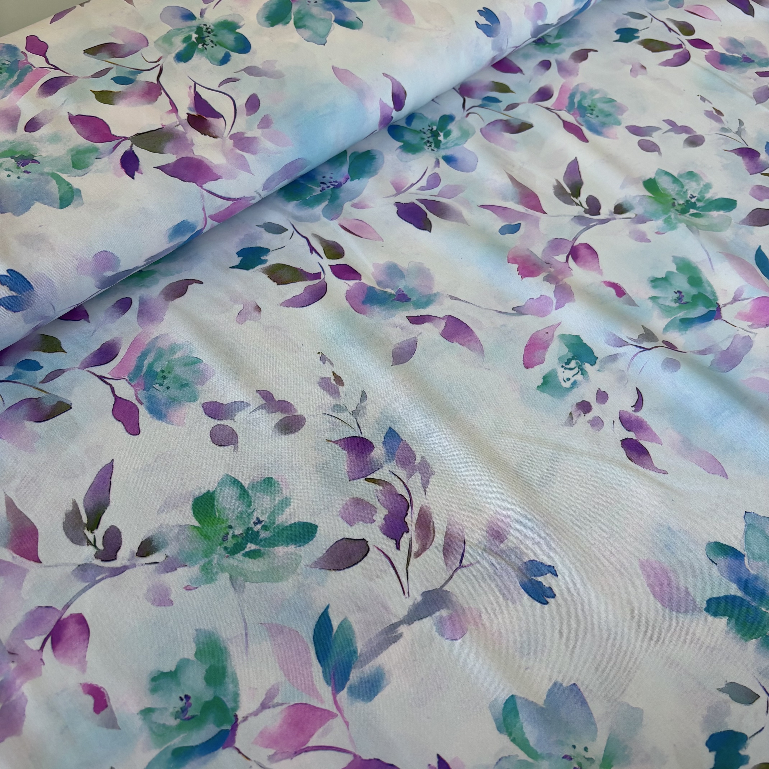 Viskose türkis geblümt