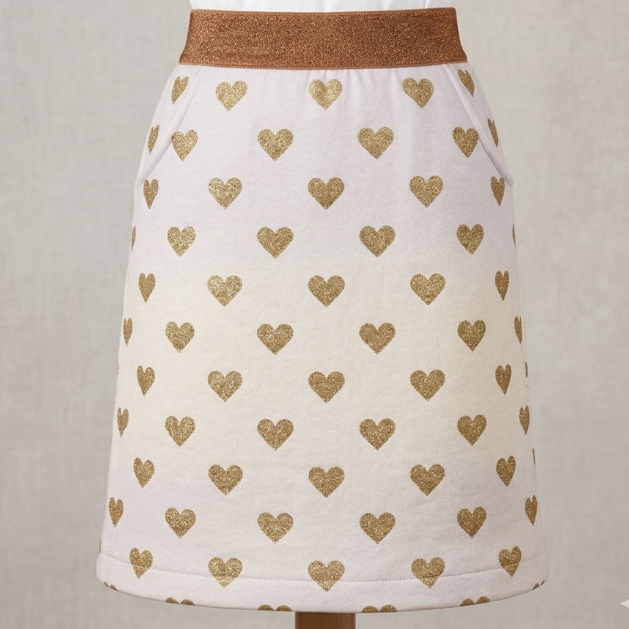 Strickstoff ecu mit goldenen Herzen 