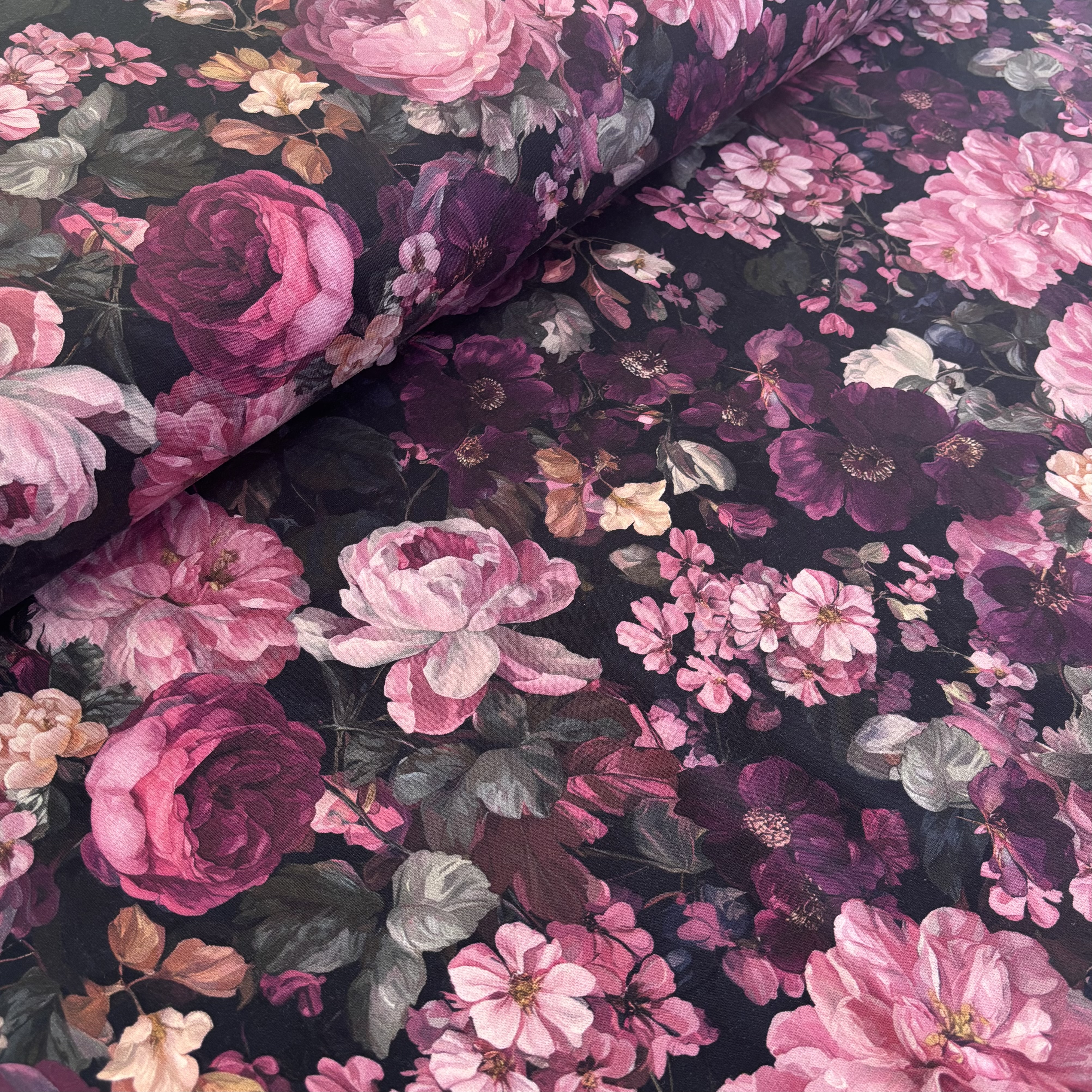 Sweatstoff French Terry schwarz mit blumen